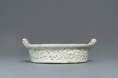 A polychrome Brussels faience '&agrave; la haie fleurie' reticulated basket, 18th C.